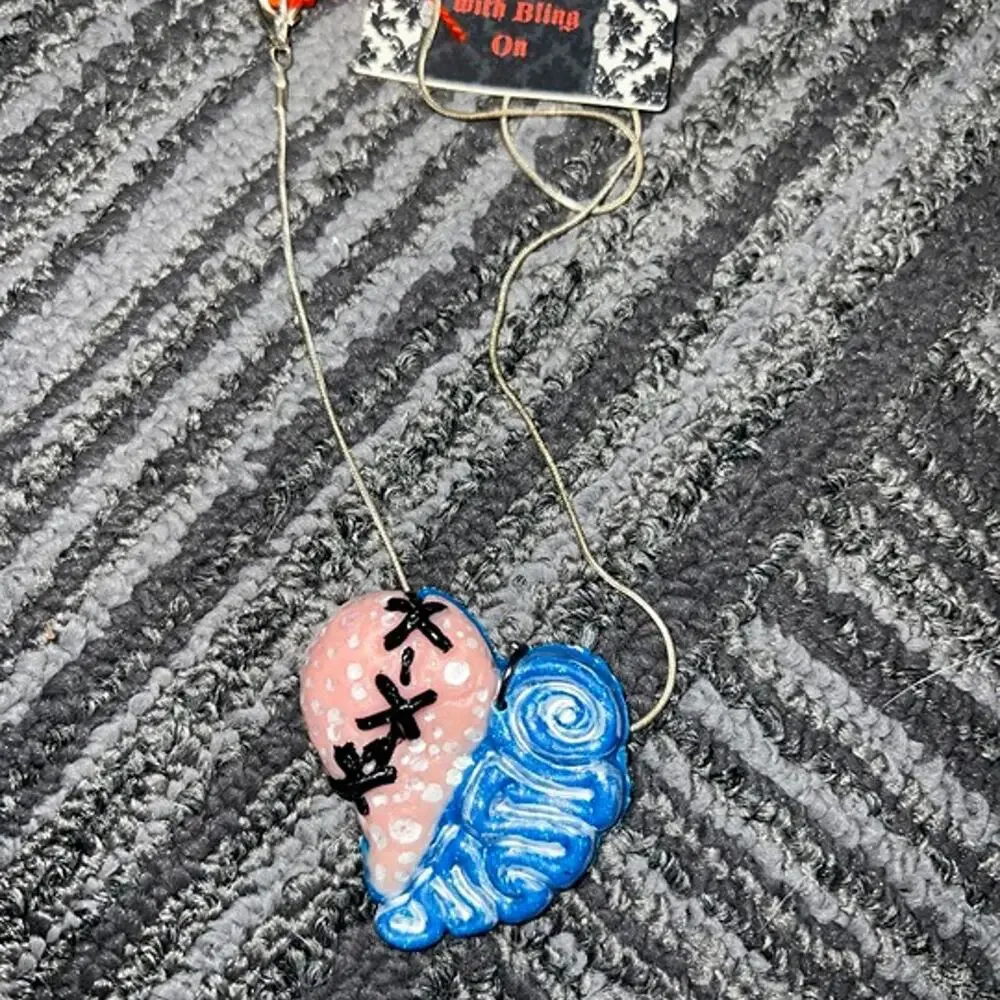 Two tone pink glitter resin stitched heart pendant necklace